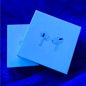2 New AirPod Pros with the wrapper still on it